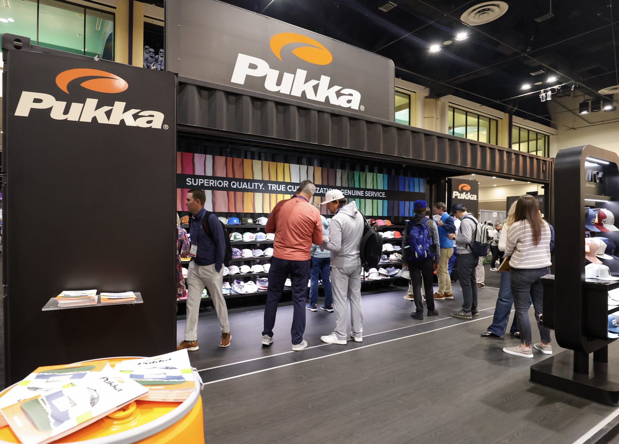 Pukka custom golf headwear display at PGA show