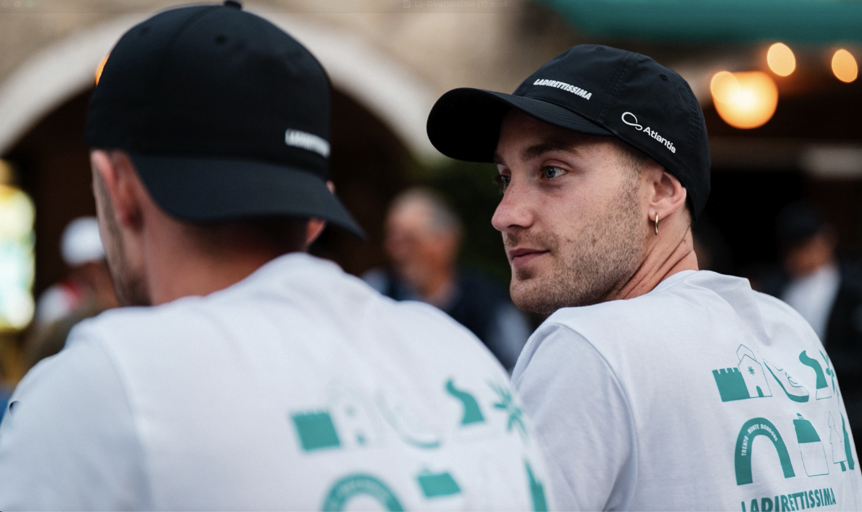 Athletes wearing Atlantis caps during La Direttissima